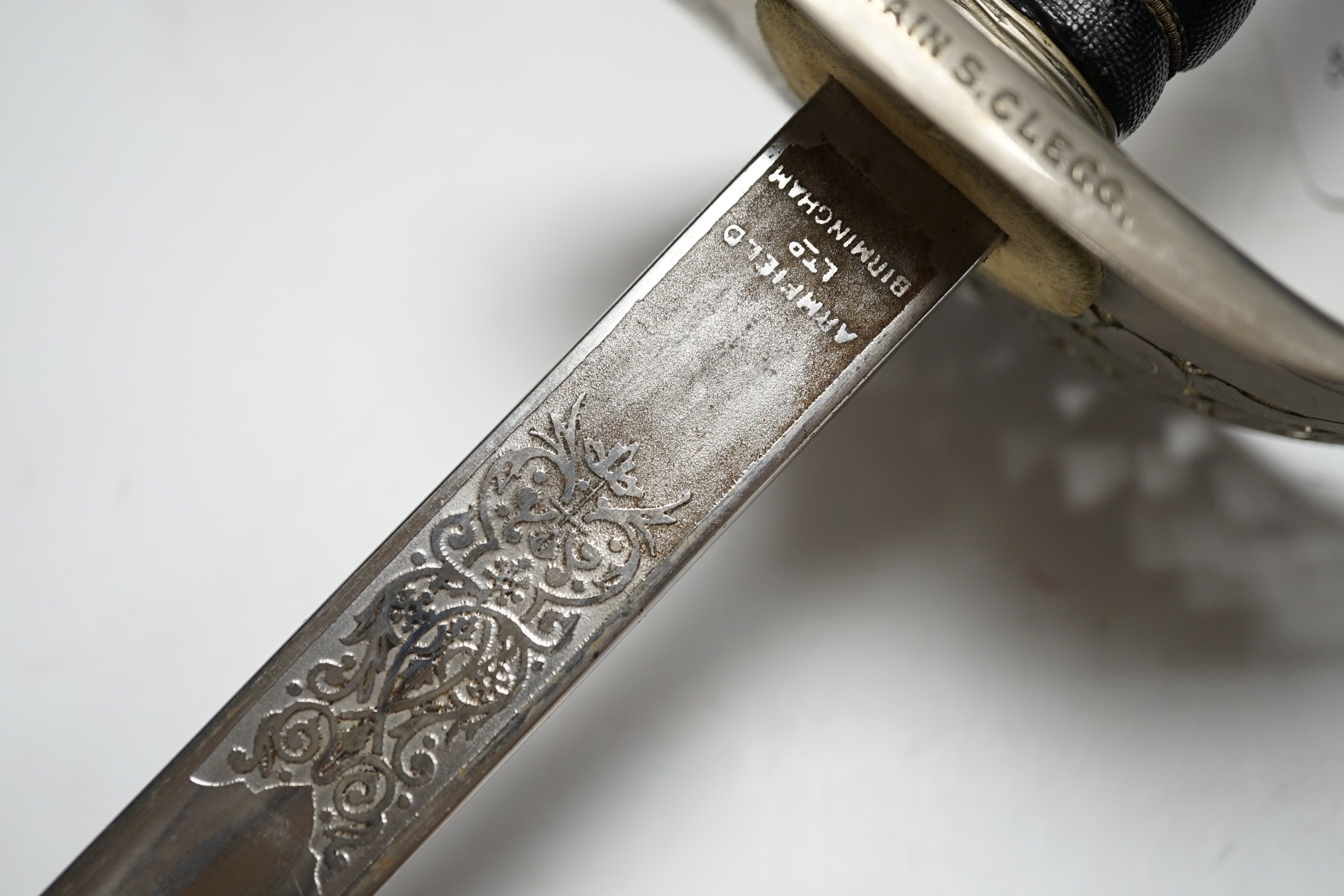 A George V officer's sword, manufactured by Armfield Ltd and engraved ‘Captain S.Clegg’ to hilt, with scabbard